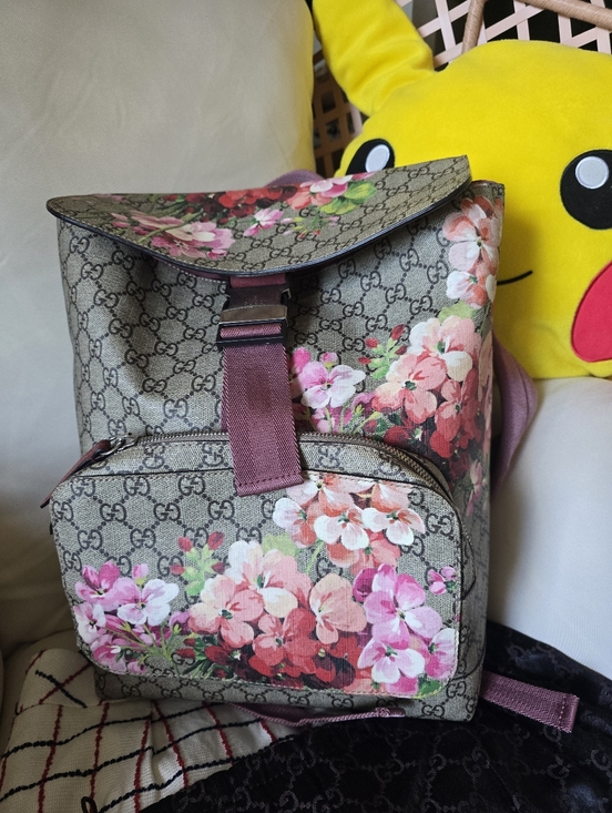 Gucci Handbags - Authentic Gucci Brown GG Supreme Floral Canvas Backpack with Pink Interior